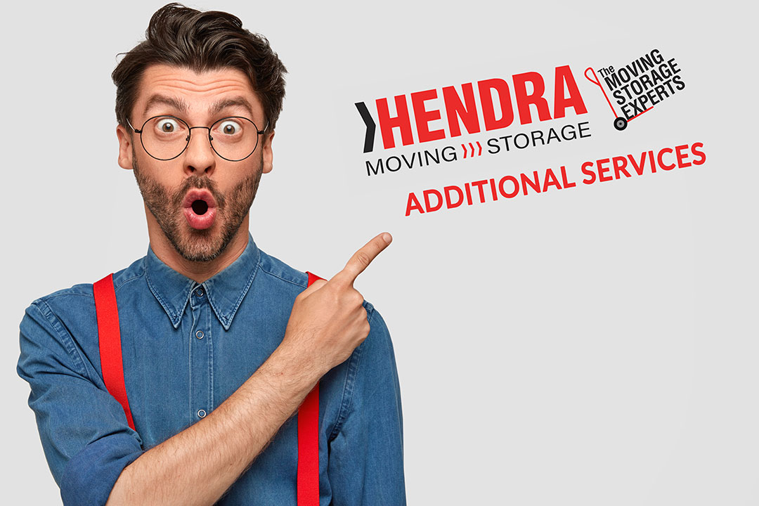 Additional Services by Hendra Moving and Storage surprises a man in glasses and red suspenders